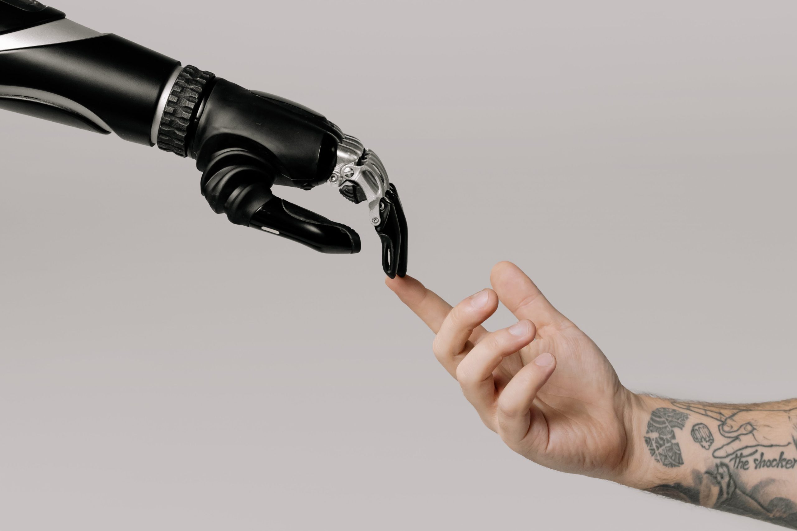 A human finger touching an AI